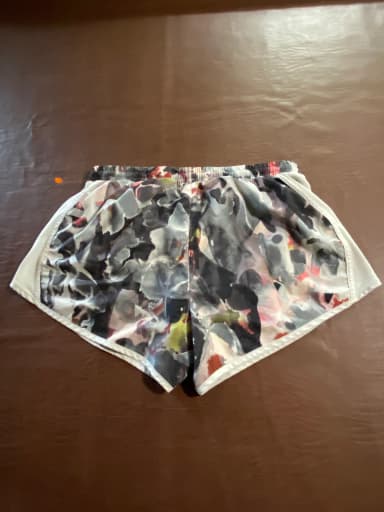Multicolor Under Armour heat gear running shorts